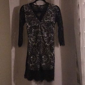 Beautiful lace never been worn mini dress.
